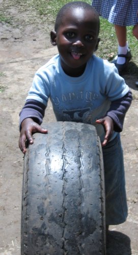kid-with-tire
